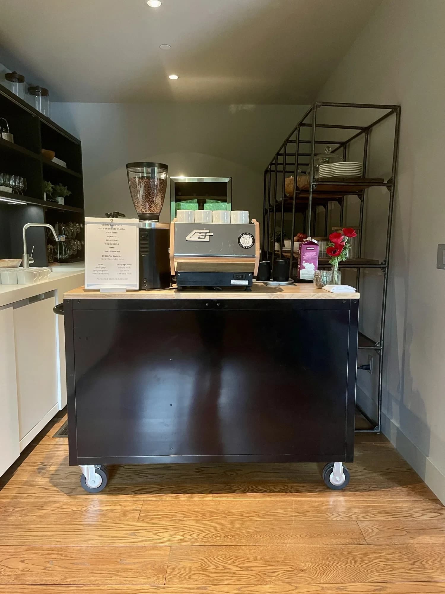 Black Flipside espresso cart set up indoors in a small venue room