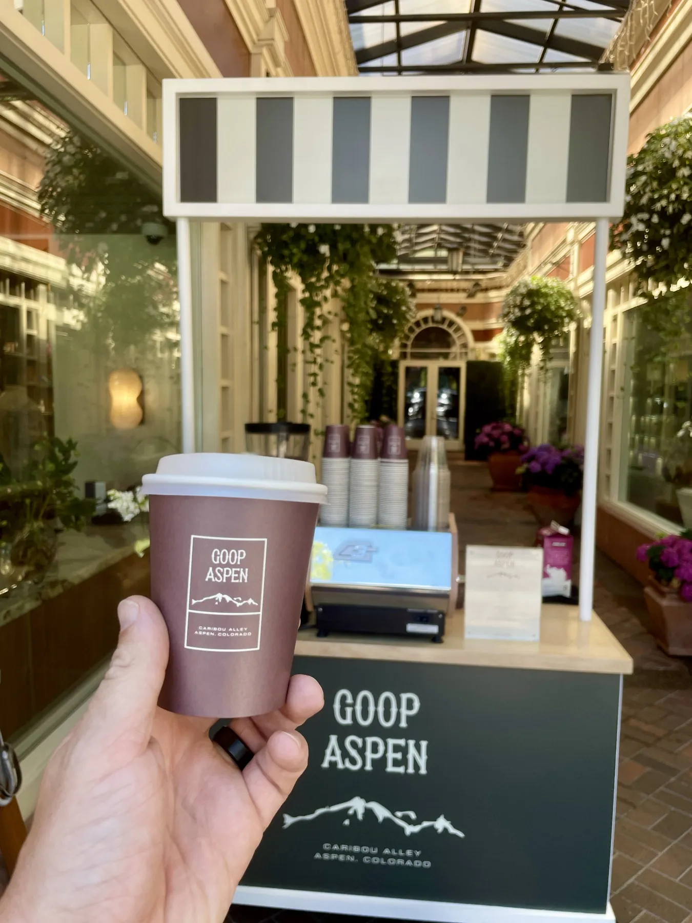 Custom-branded Flipside coffee cart at a Goop brand activation