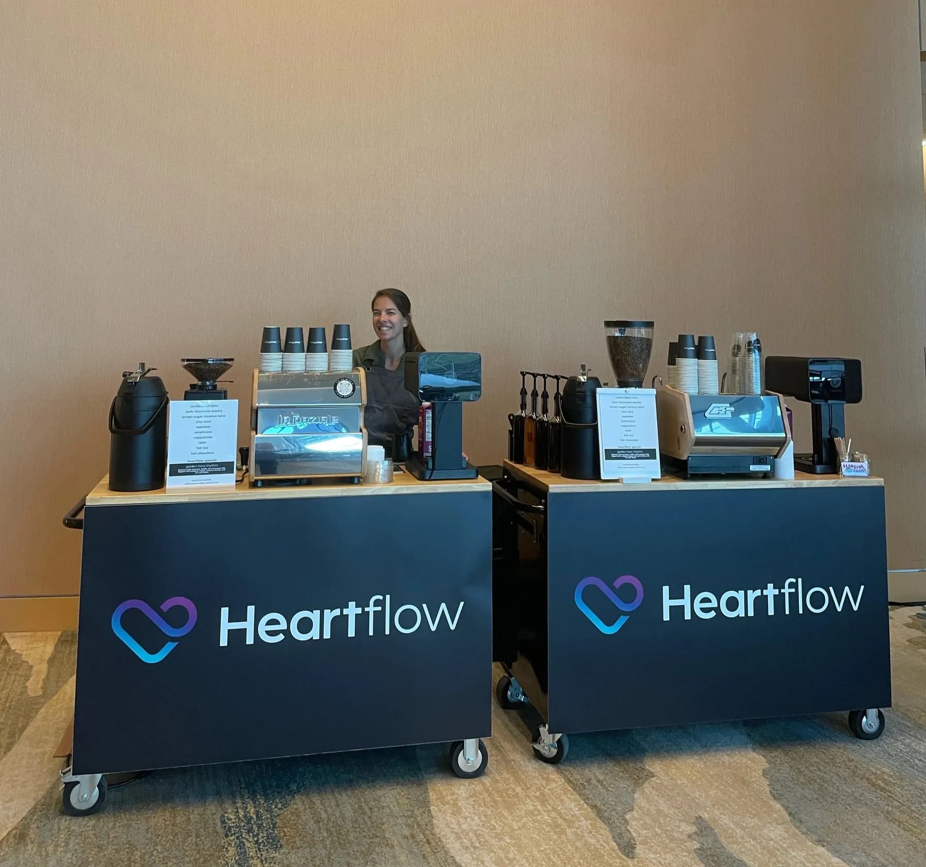 Two Flipside Coffee carts set up side by side for a corporate event
