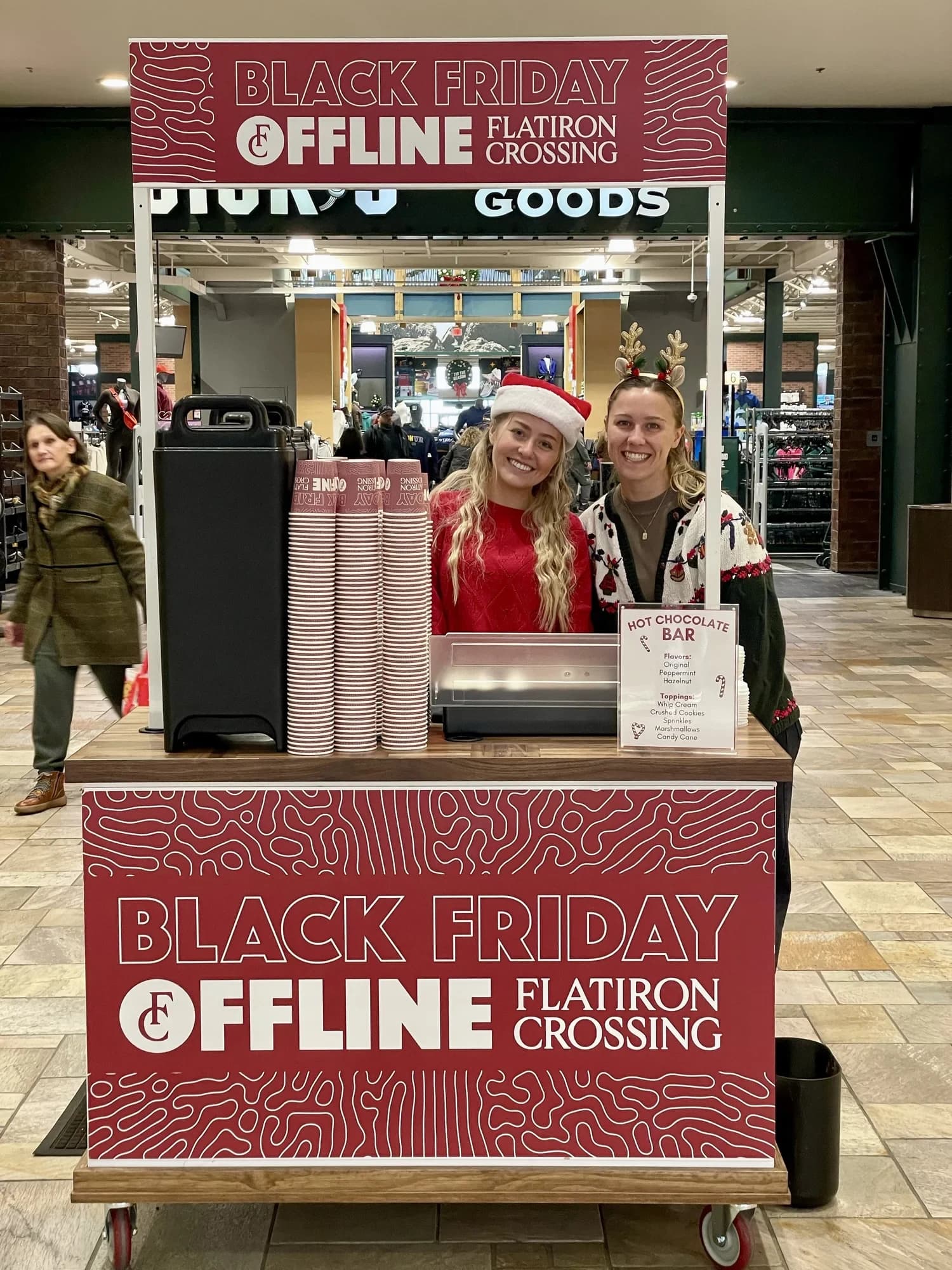 Flipside hot chocolate bar cart with flavor and topping sign at Flatiron Crossing