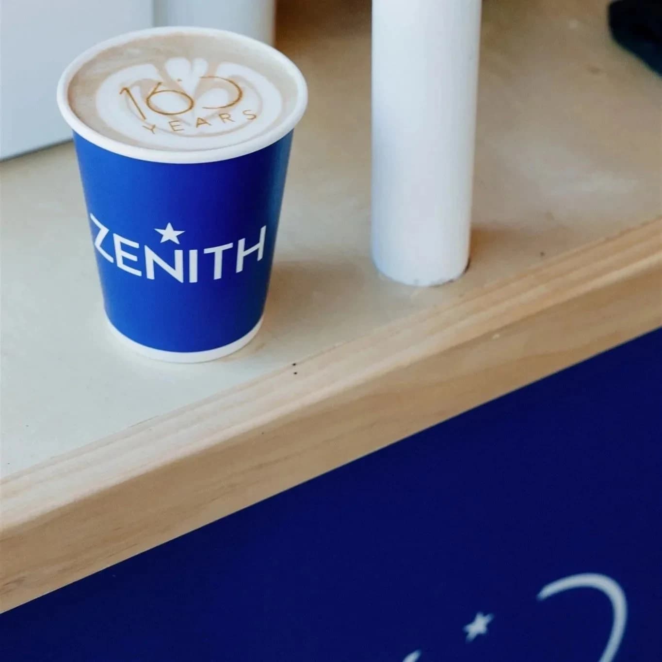 ZENITH cup with '150 years' printed on the latte foam at Aspen Watch Week