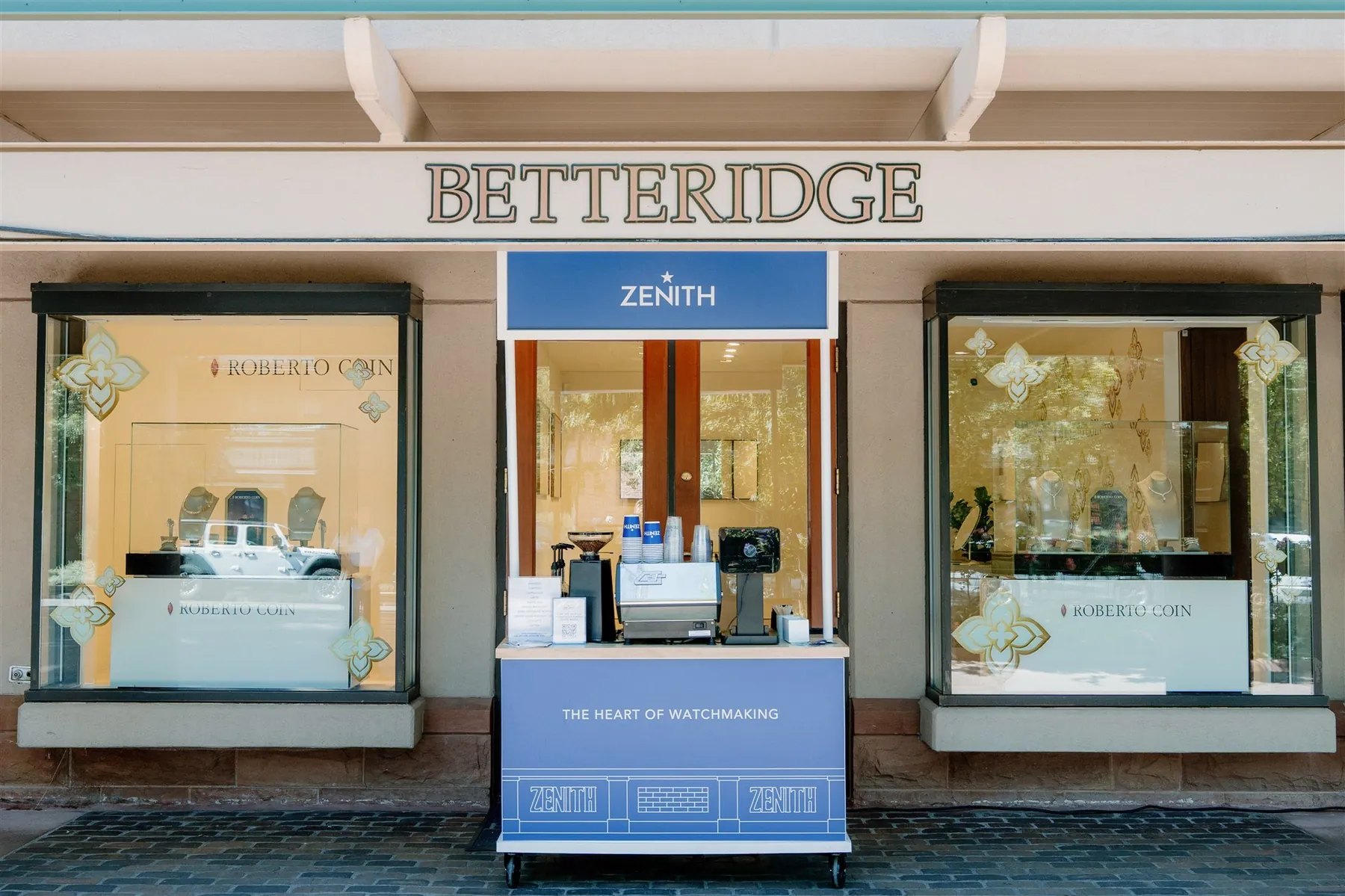 Flipside Coffee branded mobile espresso cart set up outside a Betteridge storefront for a Zenith brand activation